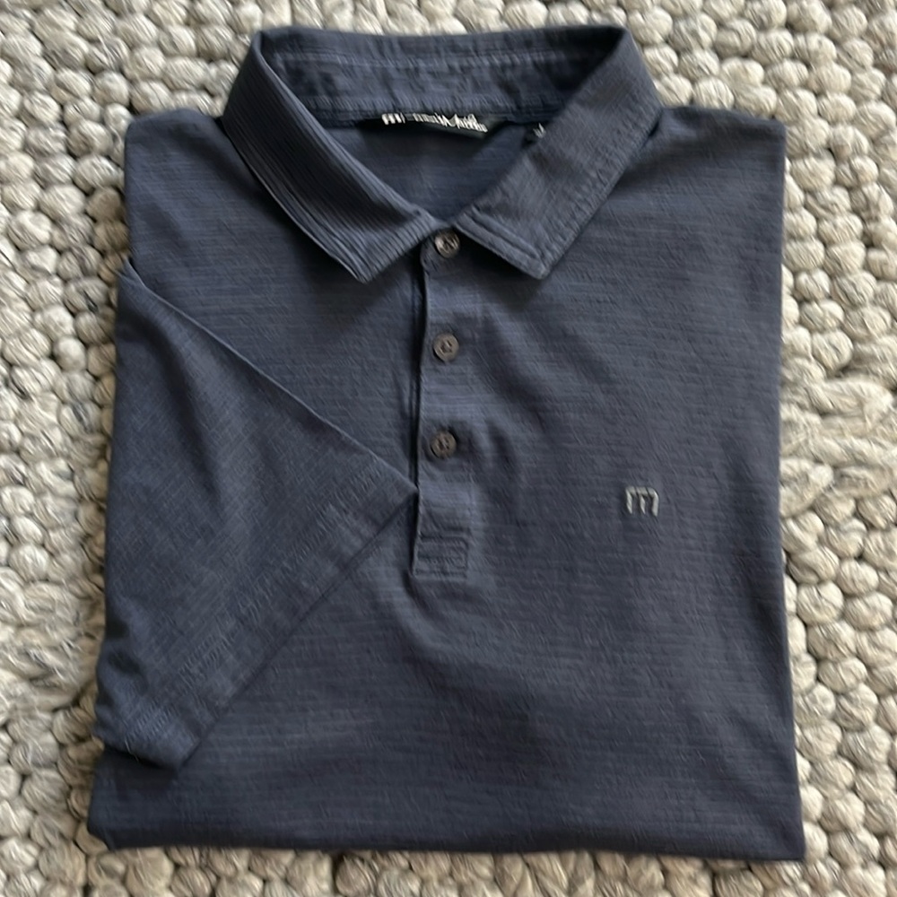 Travis Mathew bluish gray polo with subtle stripe